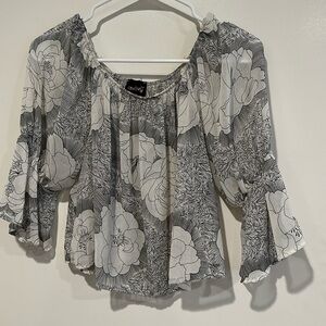 Off the shoulder, sheer blouse, black, and white